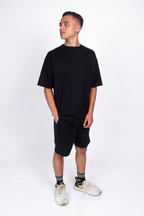 Conjunto oversized de algodón negro de la marca JOBAN, con camiseta y pantalones cómodos y de estilo casual.